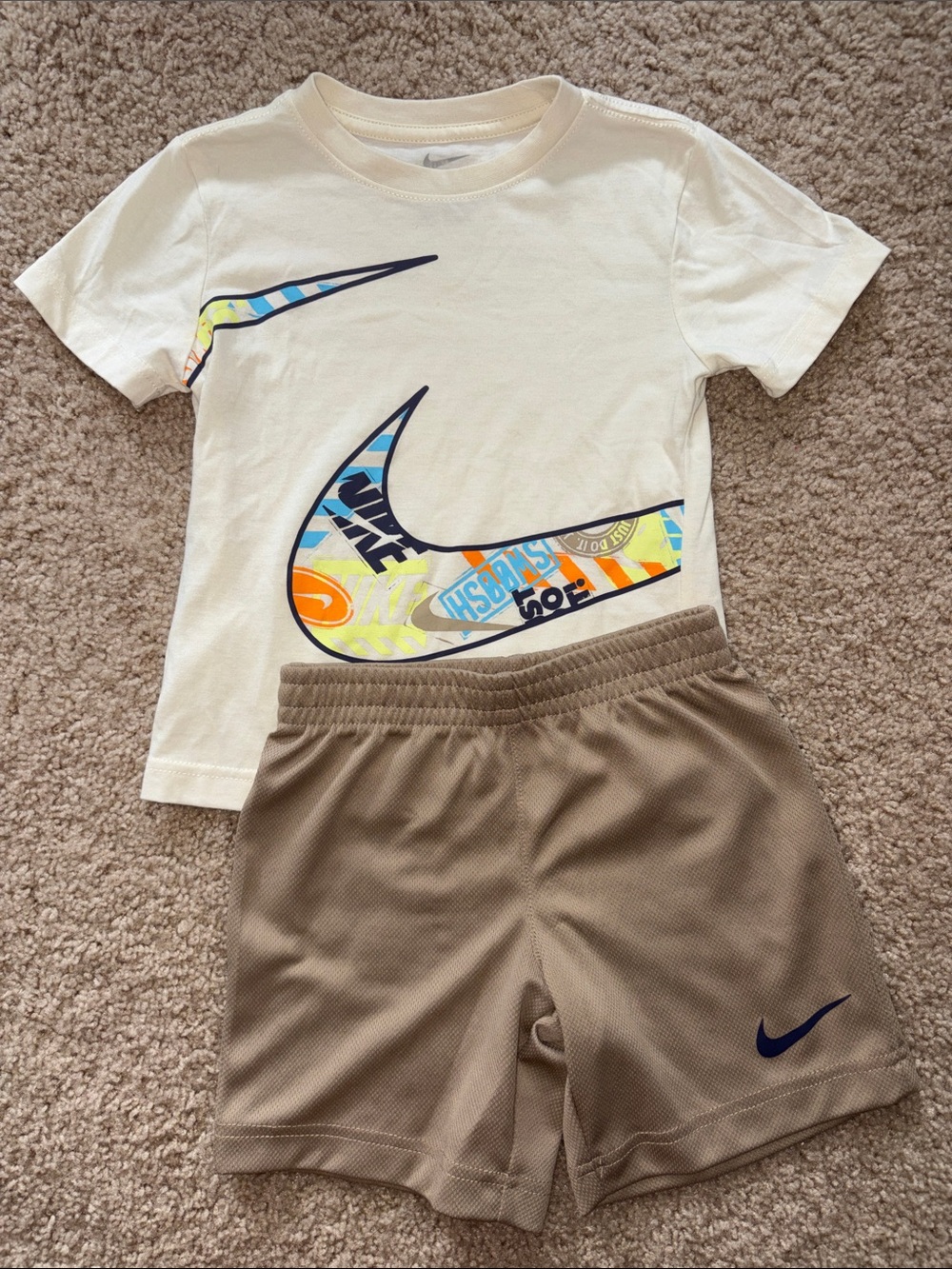 Nike Cream Graphic Tee with Tan Athletic Shorts